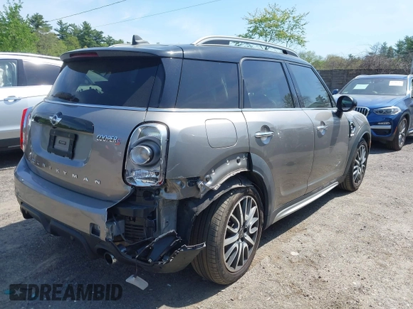 2017 MINI Countryman Cooper S z VIN WMZYT5C33H3D79148, wystawiony jako IAAI lot #42225781 z przebiegiem 95 023 mil mil oraz . Historia ofert i sprzedaży dostępna na DreamBid. Obrazek 4.