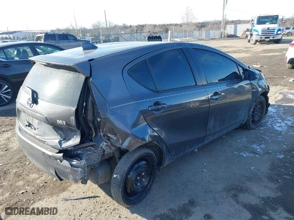 2015 Toyota Prius c One with VIN JTDKDTB36F1113749, listed as a IAAI auction lot 41366238 with 121,610 mi miles. Bid and sale history available at carsss.com. Image 4.