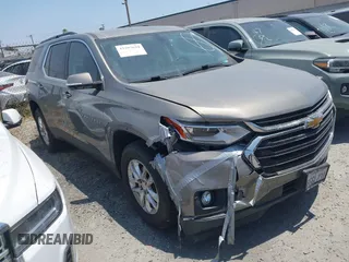 2019 Chevrolet Traverse LT Cloth z VIN 1GNERGKW8KJ121661, wystawiony jako IAAI lot #42397659 z przebiegiem 102 785 mil mil oraz . Historia ofert i sprzedaży dostępna na DreamBid. Obrazek 1.