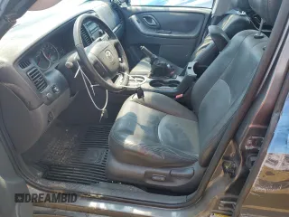 2006 Mazda Tribute S with VIN 4F2YZ06166KM08346, listed as a Copart auction lot 46318214 with 78,615 mi miles and Salvage Title. Bid and sale history available at DreamBid. Image 7.