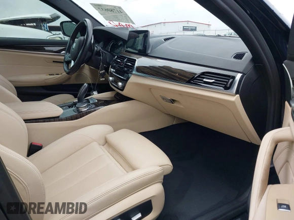 2018 BMW 5 Series 530i with VIN WBAJA5C55JWA39526, listed as a IAAI auction lot 41780637 with 121,693 mi miles and . Bid and sale history available at DreamBid. Image 5.