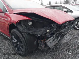 2019 Tesla Model X 75D with VIN 5YJXCBE23KF207739, listed as a IAAI auction lot 41808567 with 191,233 mi miles and . Bid and sale history available at DreamBid. Image 6.