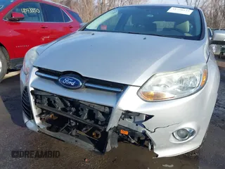 2012 Ford Focus SEL with VIN 1FAHP3M22CL413512, listed as a IAAI auction lot 41758125 with 161,857 mi miles. Bid and sale history available at carsss.com. Image 6.