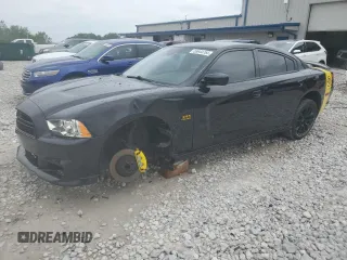 2013 Dodge Charger Police с VIN 2C3CDXAT2DH693128, выставлен на аукционе Copart как лот 59944765 с пробегом 119 572 миль миль и Чистый • Clean title. История ставок и продаж доступна на DreamBid. Изображение 1.
