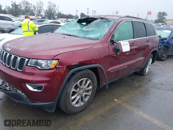 2021 Jeep Grand Cherokee Laredo X with VIN 1C4RJEAG4MC681989, listed as a IAAI auction lot 41571341 with 61,090 mi miles and . Bid and sale history available at DreamBid. Image 2.