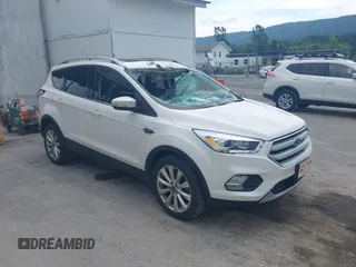 2018 Ford Escape Titanium z VIN 1FMCU9J94JUC00775, wystawiony jako IAAI lot #42727999 z przebiegiem 69 486 mil mil oraz . Historia ofert i sprzedaży dostępna na DreamBid. Obrazek 1.