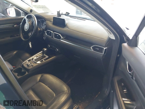 2018 Mazda CX-5 Grand Touring with VIN JM3KFBDM4J0302870, listed as a IAAI auction lot 41934217 with 57,151 mi miles. Bid and sale history available at carsss.com. Image 5.