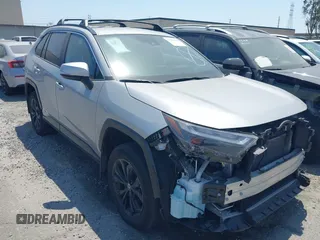 2022 Toyota RAV4 Hybrid SE with VIN 4T3T6RFV9NU070229, listed as a IAAI auction lot 42565070 with 21,901 mi miles and . Bid and sale history available at DreamBid. Image 1.