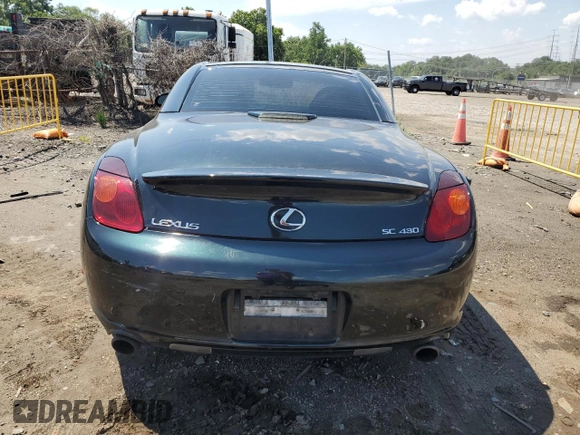 2004 Lexus SC 430 with VIN JTHFN48Y040052035, listed as a Copart auction lot 63689275 with 147,355 mi miles and Salvage title. Bid and sale history available at DreamBid. Image 6.