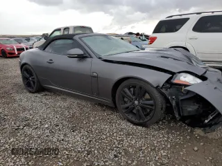 2011 Jaguar XK with VIN SAJWA4EC6BMB39972, listed as a Copart auction lot 70690864 with 98,364 mi miles and Salvage Title. Bid and sale history available at carsss.com. Image 4.