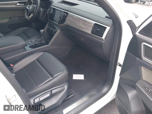 2023 Volkswagen Atlas SE with VIN 1V2JE2CA3PC227230, listed as a IAAI auction lot 42435466 with 86,217 mi miles and . Bid and sale history available at DreamBid. Image 5.