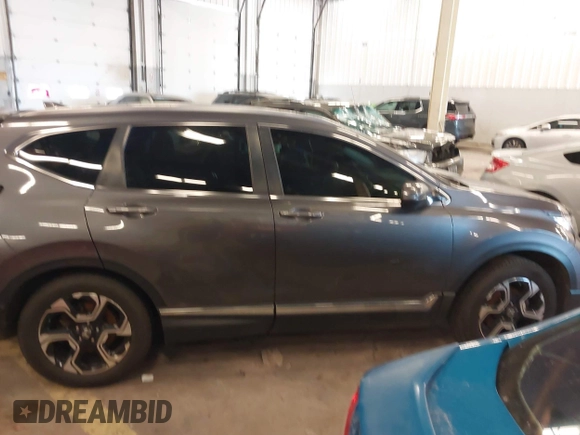 2018 Honda CR-V Touring with VIN 2HKRW2H91JH634457, listed as a IAAI auction lot 41697658 with 101,878 mi miles. Bid and sale history available at carsss.com. Image 14.