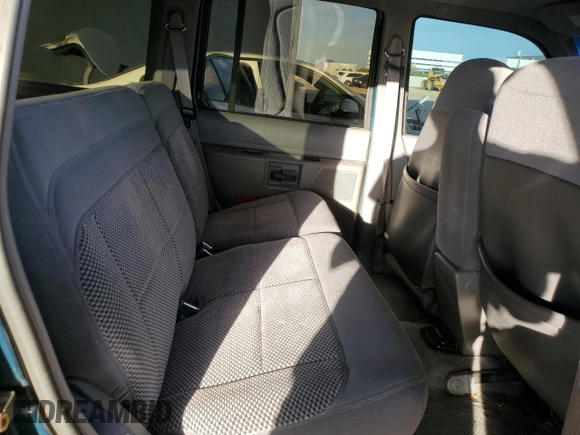 1994 Ford Explorer Eddie Bauer z VIN 1FMDU32X3RUD38012, wystawiony jako Copart lot #77417304 z przebiegiem 83 648 mil mil oraz Szkoda całkowita • Salvage title. Historia ofert i sprzedaży dostępna na DreamBid. Obrazek 12.