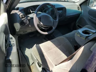 2002 Ford F-150 XL with VIN 1FTRX18L82NB06824, listed as a Copart auction lot 57342315 with 207,390 mi miles and Salvage title. Bid and sale history available at DreamBid. Image 8.
