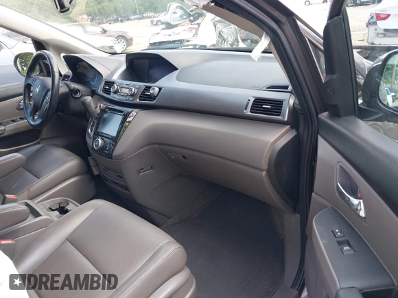 2014 Honda Odyssey Touring with VIN 5FNRL5H99EB138952, listed as a IAAI auction lot 42538833 with 146,959 mi miles and . Bid and sale history available at DreamBid. Image 5.