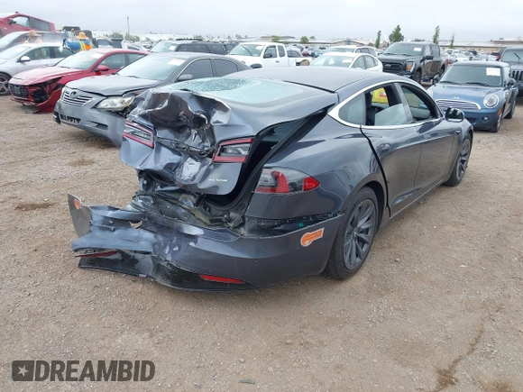2020 Tesla Model S Long Range with VIN 5YJSA1E29LF363957, listed as a IAAI auction lot 42402667 with 45,058 mi miles and . Bid and sale history available at DreamBid. Image 4.