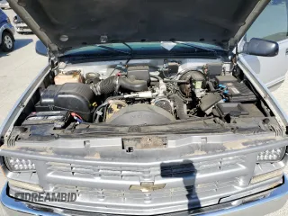 1997 Chevrolet Tahoe z VIN 3GNEK18R1VG112163, wystawiony jako Copart lot #58631925 z przebiegiem 213 262 mil mil oraz Tytuł czysty. Historia ofert i sprzedaży dostępna na DreamBid. Obrazek 12.