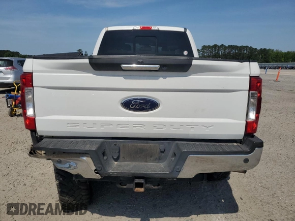 2019 Ford F-250 XL with VIN 1FT7W2BT4KED34411, listed as a Copart auction lot 54476875 with 185,274 mi miles and Salvage title. Bid and sale history available at DreamBid. Image 6.