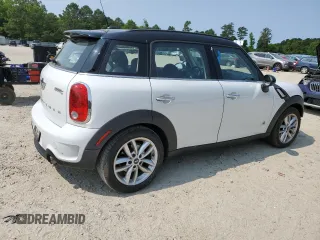 2014 MINI Countryman S with VIN WMWZC5C5XEWP37128, listed as a Copart auction lot 59549885 with 84,121 mi miles and Salvage title. Bid and sale history available at DreamBid. Image 3.