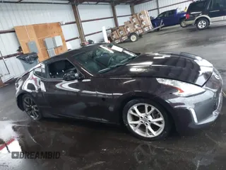 2016 Nissan 370Z with VIN JN1AZ4EHXGM935516, listed as a IAAI auction lot 41966014 with 92,147 mi miles. Bid and sale history available at carsss.com. Image 13.
