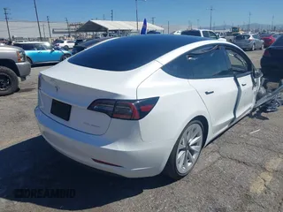 2022 Tesla Model 3 Long Range with VIN 5YJ3E1EB7NF298456, listed as a IAAI auction lot 41859304 with Not Provided miles and . Bid and sale history available at DreamBid. Image 4.