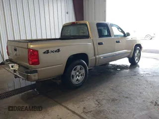 2005 Dodge Dakota Laramie with VIN 1D7HW58N15S159061, listed as a IAAI auction lot 41898306 with 114,288 mi miles and . Bid and sale history available at DreamBid. Image 4.