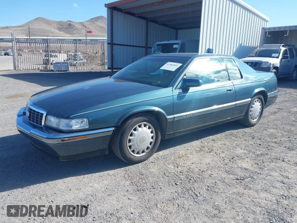 1993 Cadillac Eldorado ESC z VIN 1G6EL12Y4PU609197, wystawiony jako IAAI lot #41902066 z przebiegiem 96 251 mil mil oraz . Historia ofert i sprzedaży dostępna na DreamBid. Obrazek 2.