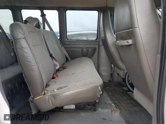 2014 Chevrolet Express Passenger LT z VIN 1GAZG1FG2E1154233, wystawiony jako Copart lot #63480385 z przebiegiem Nie podano mil oraz Nie do naprawy • Non repairable. Historia ofert i sprzedaży dostępna na DreamBid. Obrazek 11.