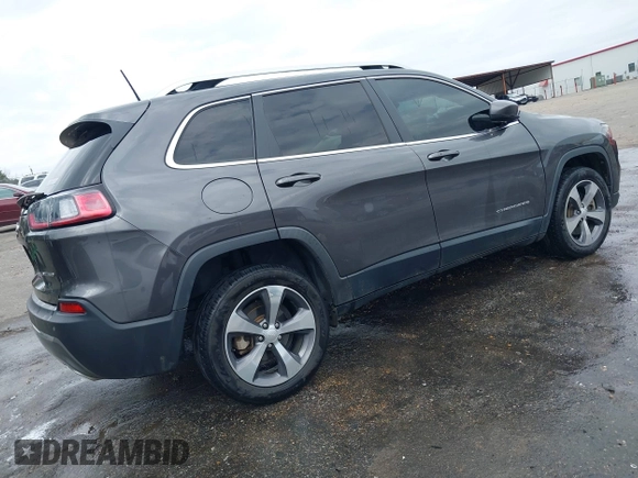 2020 Jeep Cherokee Limited with VIN 1C4PJLDN0LD552064, listed as a IAAI auction lot 41567994 with 74,816 mi miles. Bid and sale history available at carsss.com. Image 4.