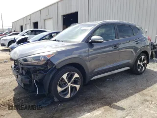 2018 Hyundai Tucson Sport z VIN KM8J33ALXJU764322, wystawiony jako Copart lot #59739985 z przebiegiem 79 882 mil mil oraz Szkoda całkowita • Salvage title. Historia ofert i sprzedaży dostępna na DreamBid. Obrazek 1.
