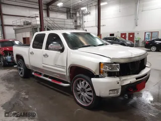 2009 Chevrolet Silverado 1500 LTZ with VIN 3GCEK33M39G177554, listed as a IAAI auction lot 41282566 with 142,356 mi miles. Bid and sale history available at carsss.com. Image 1.