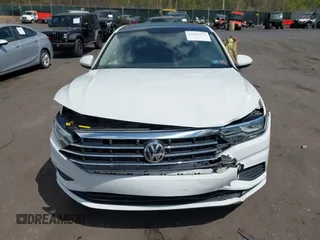 2020 Volkswagen Jetta S z VIN 3VWC57BU2LM078947, wystawiony jako IAAI lot #42181277 z przebiegiem 28 292 mil mil oraz . Historia ofert i sprzedaży dostępna na DreamBid. Obrazek 6.