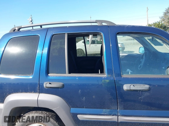 2003 Jeep Liberty Sport with VIN 1J4GL48K83W663248, listed as a IAAI auction lot 42056561 with 161,652 mi miles. Bid and sale history available at carsss.com. Image 6.