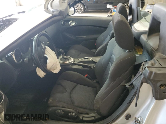 2014 Nissan 370Z Touring with VIN JN1AZ4FH0EM621207, listed as a Copart auction lot 50928485 with Not Provided miles and Salvage Title. Bid and sale history available at DreamBid. Image 7.