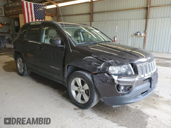2014 Jeep Compass Latitude with VIN 1C4NJDEB1ED661332, listed as a Copart auction lot 53958985 with 116,020 mi miles and Salvage Title. Bid and sale history available at DreamBid. Image 4.