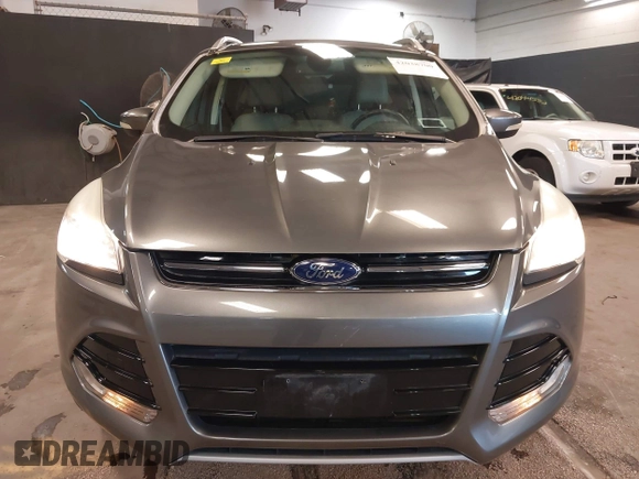 2014 Ford Escape Titanium with VIN 1FMCU9JX0EUE45254, listed as a IAAI auction lot 42038700 with 60,103 mi miles. Bid and sale history available at carsss.com. Image 12.