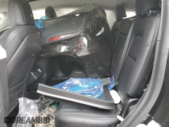 2021 Tesla Model Y Long Range z VIN 5YJYGDEE7MF093942, wystawiony jako Copart lot #54762425 z przebiegiem 20 492 mil mil oraz Szkoda całkowita • Salvage title. Historia ofert i sprzedaży dostępna na DreamBid. Obrazek 10.