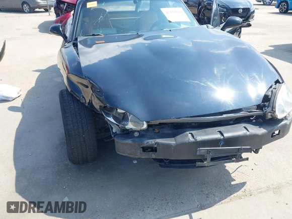 2002 Mazda MX-5 Miata Cloth with VIN JM1NB353520221312, listed as a IAAI auction lot 42410028 with 99,375 mi miles and . Bid and sale history available at DreamBid. Image 6.