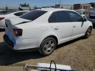 2010 Volkswagen Jetta S with VIN 3VWJZ7AJ0AM079420, listed as a Copart auction lot 62963995 with 244,277 mi miles and Salvage title. Bid and sale history available at DreamBid. Image 3.