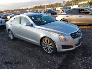 2013 Cadillac ATS Luxury with VIN 1G6AH5S37D0126611, listed as a IAAI auction lot 40982726 with 127,572 mi miles. Bid and sale history available at carsss.com. Image 1.