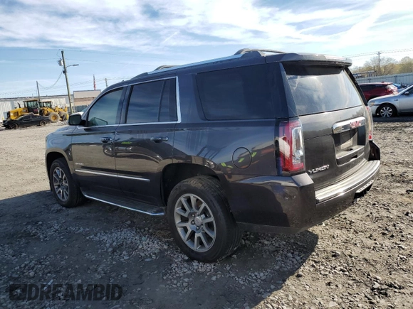 2015 GMC Yukon Denali with VIN 1GKS2CKJ9FR727818, listed as a Copart auction lot 50410655 with 0 mi miles and Salvage Title. Bid and sale history available at carsss.com. Image 2.