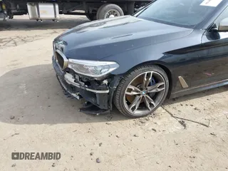 2018 BMW 5 Series M550i xDrive with VIN WBAJB9C50JB036400, listed as a IAAI auction lot 41464278 with 139,079 mi miles and . Bid and sale history available at DreamBid. Image 17.