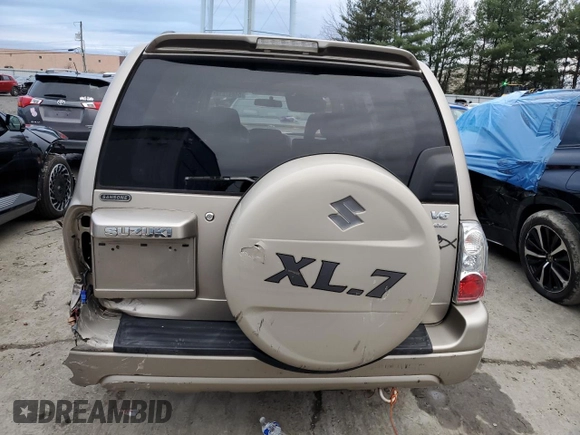 2004 Suzuki XL7 LX z VIN JS3TX92V744100442, wystawiony jako Copart lot #84847614 z przebiegiem 82 751 mil mil oraz Szkody całkowita. Historia ofert i sprzedaży dostępna na DreamBid. Obrazek 6.