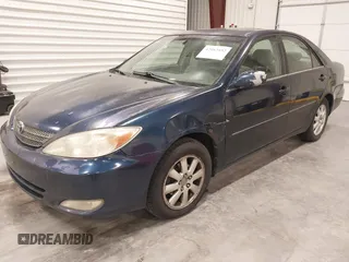 2003 Toyota Camry LE with VIN 4T1BE30K03U152348, listed as a IAAI auction lot 42082892 with 224,721 mi miles and . Bid and sale history available at DreamBid. Image 2.