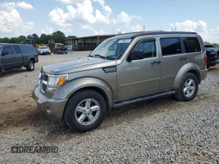 2007 Dodge Nitro SXT with VIN 1D8GT28K37W659545, listed as a Copart auction lot 61988235 with 94,049 mi miles and Salvage title. Bid and sale history available at DreamBid. Image 1.