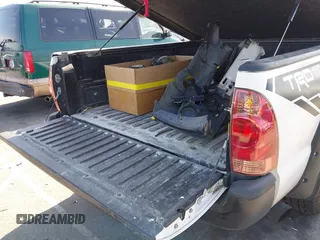 2014 Toyota Tacoma with VIN 5TFNX4CN7EX041191, listed as a IAAI auction lot 42141570 with 227,969 mi miles and . Bid and sale history available at DreamBid. Image 18.