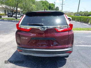 2019 Honda CR-V LX z VIN 2HKRW5H32KH409284, wystawiony jako IAAI lot #42469438 z przebiegiem 143 379 mil mil oraz . Historia ofert i sprzedaży dostępna na DreamBid. Obrazek 16.