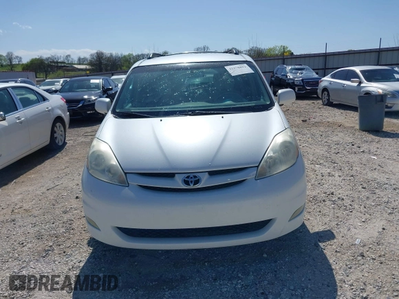 2006 Toyota Sienna XLE with VIN 5TDZA22C06S576958, listed as a IAAI auction lot 41978892 with 257,598 mi miles. Bid and sale history available at carsss.com. Image 13.