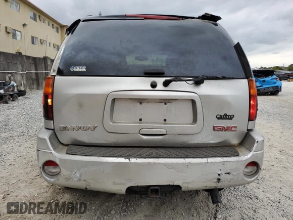 2005 GMC Envoy SLT with VIN 1GKDS13S352101385, listed as a Copart auction lot 89271025 with 165,670 mi miles and Salvage Title. Bid and sale history available at carsss.com. Image 6.