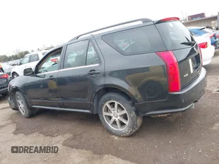 2004 Cadillac SRX with VIN 1GYDE63A540153774, listed as a IAAI auction lot 41500070 with 144,718 mi miles. Bid and sale history available at carsss.com. Image 14.